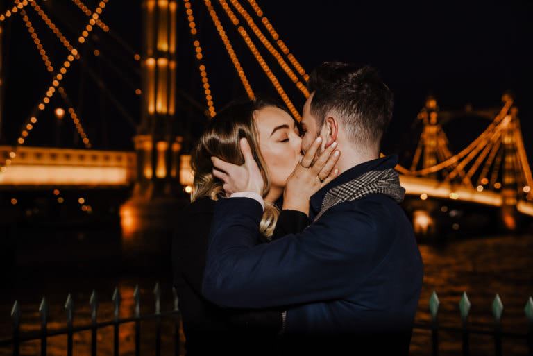 couple kissing near Chelsea Bridge
