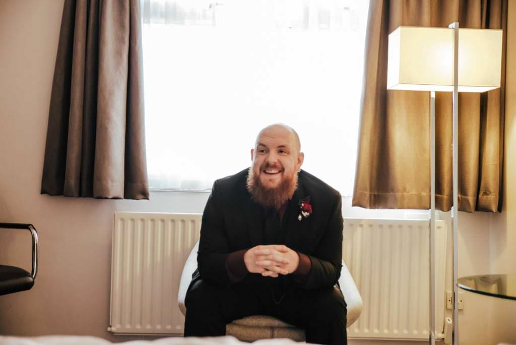 Samat the Hilton Hotel Watford , getting ready for his with is grooms menwedding