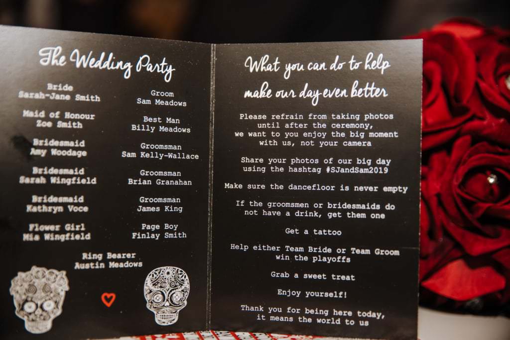 Dancing couple at the wedding reception Shenley cricket club , white wedding dress, black and red themed wedding