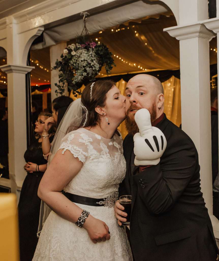 Dancing couple at the wedding reception Shenley cricket club , white wedding dress, black and red themed wedding