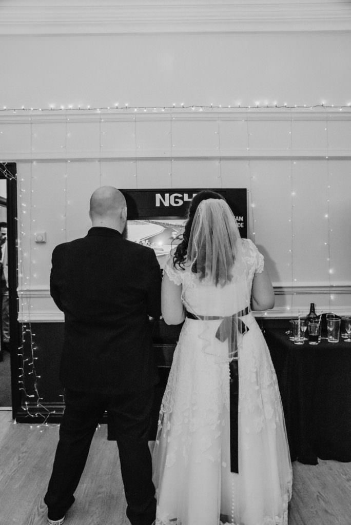 Wedding first dance at the Shenley Cricket club, Sarah and Sam playing NG4 playstaion gaming station