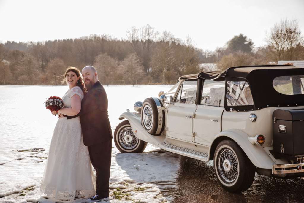 Sarah and Sam weddiing couple outside Shenley Cricket club for thei