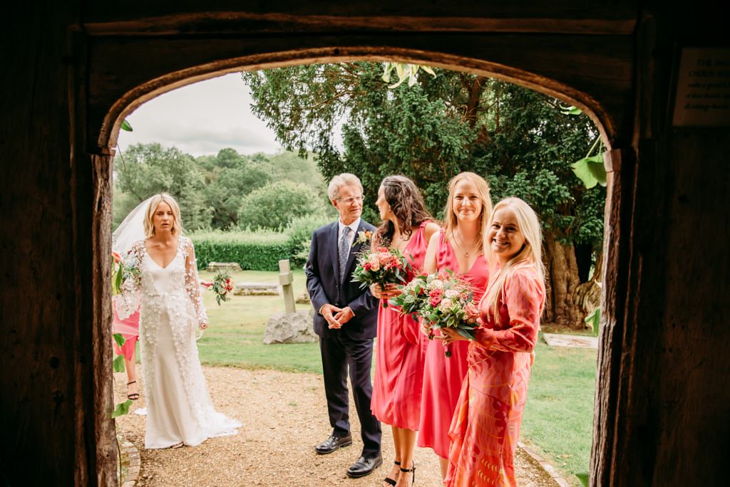 festival-theme-surrey-wedding-roshni-photography-church-ceremony-bride-dad-aisle